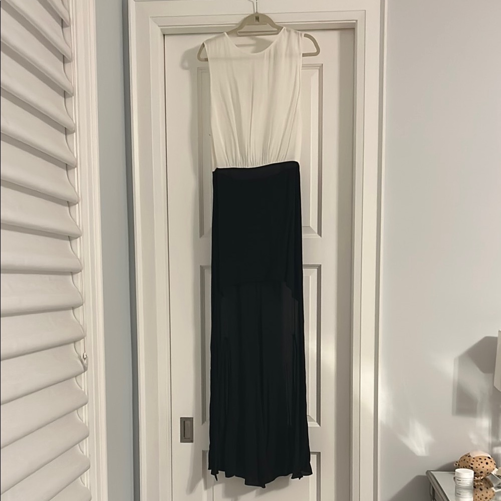 MAJE SILK SHORT IN FRONT TO LONG AT BACKElegant Black and White Sleeveless Dress